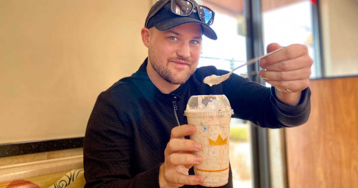 man with Burger King shake and spoon