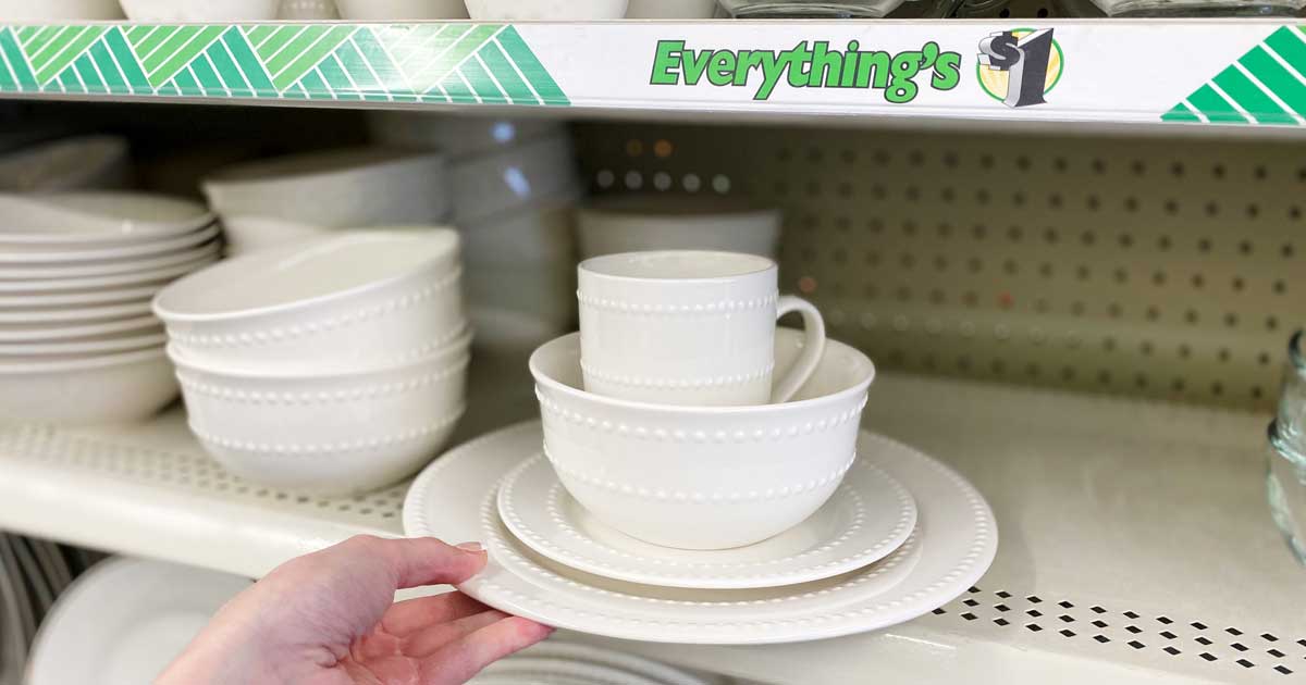 woman holding a dinnerware set