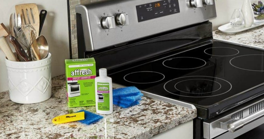 Affresh cooktop cleaner kit next to stove