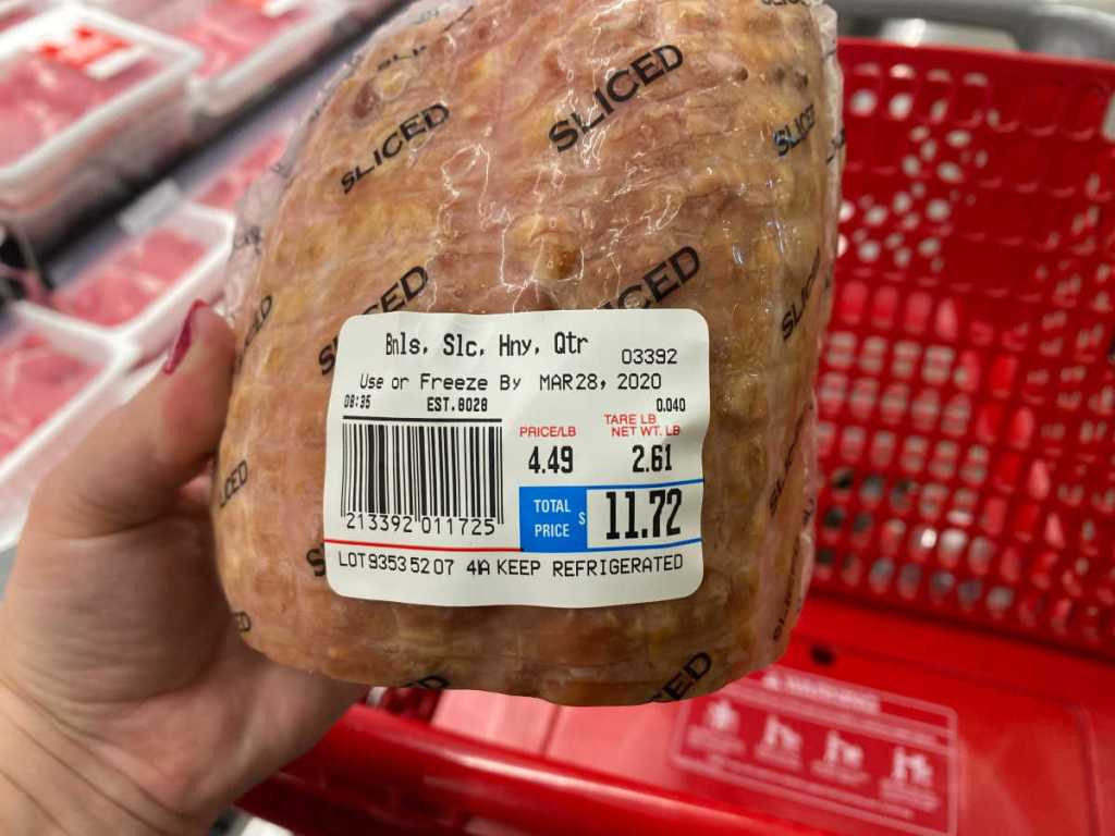 hand holding Hickory Smoked Boneless Honey Ham Sliced at target