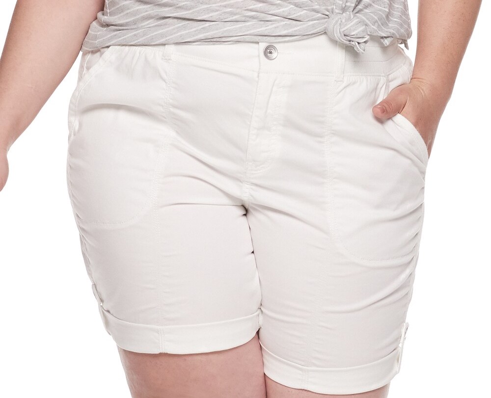 person wearing a pair of white shorts