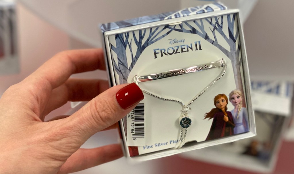 hand holding Frozen 2 Bracelet box