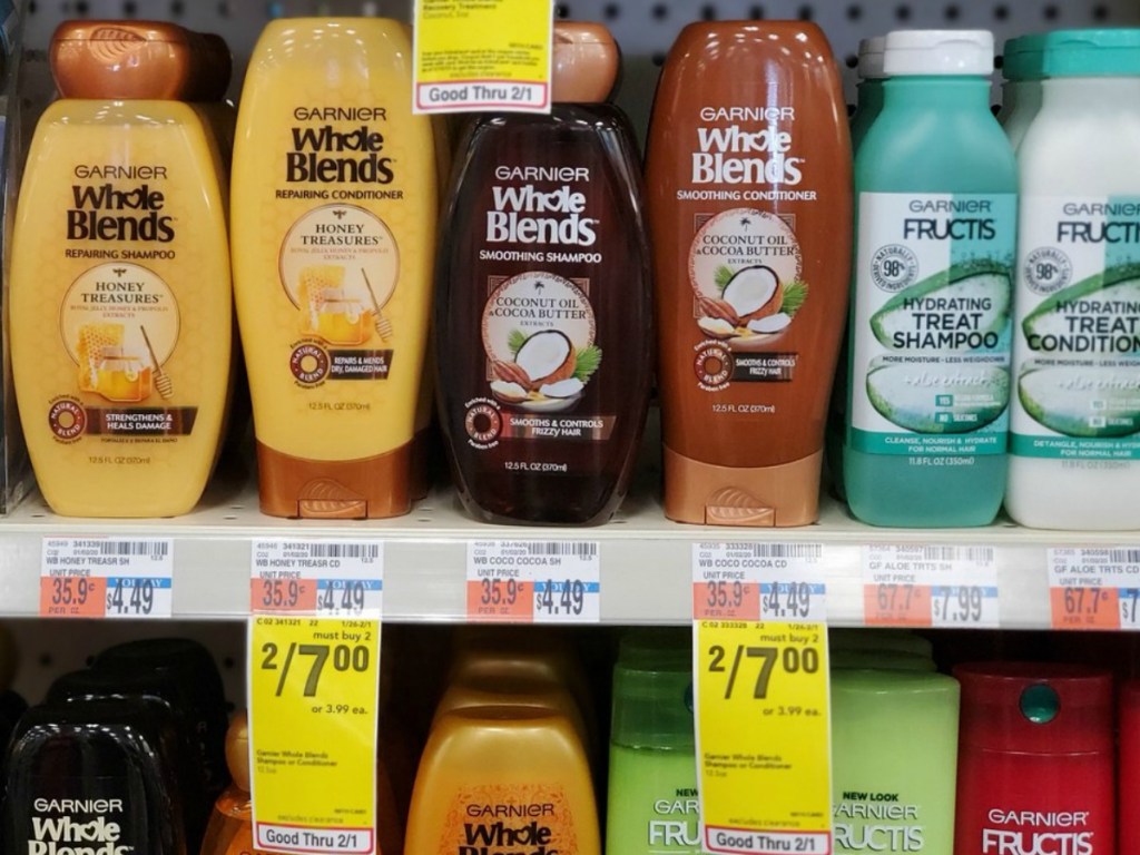 store display with several hair products and price tag signs