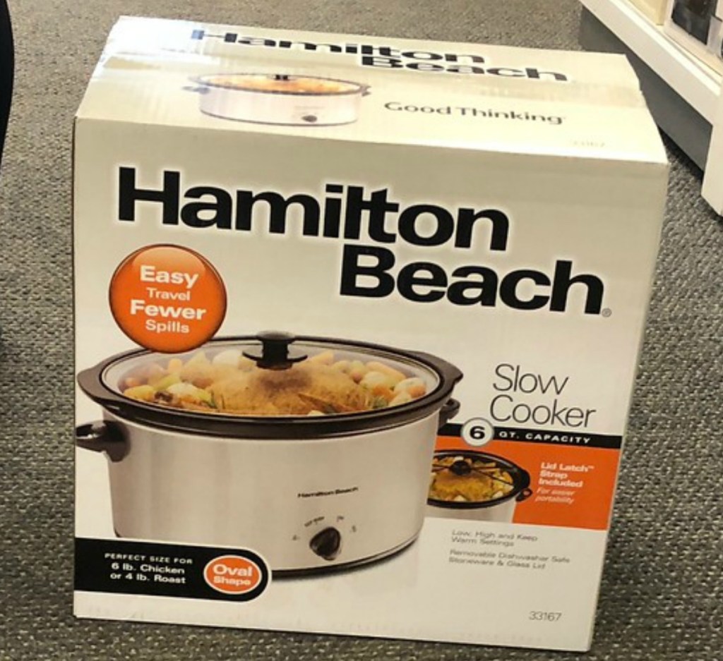 Large slow cooker in package on floor in-store