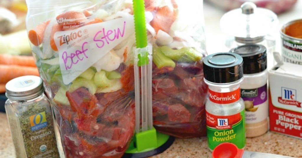 ziploc bag with beef stew inside on counter with spices