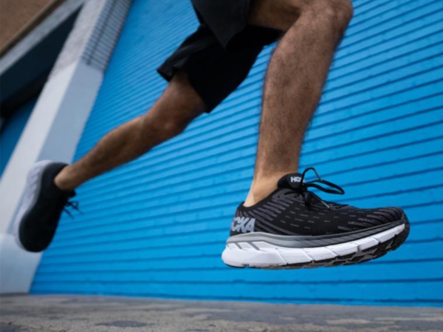 Man running in black running shoe