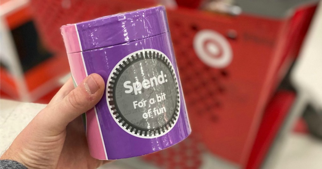 Man's hand holding Money Jar for Kids at Target