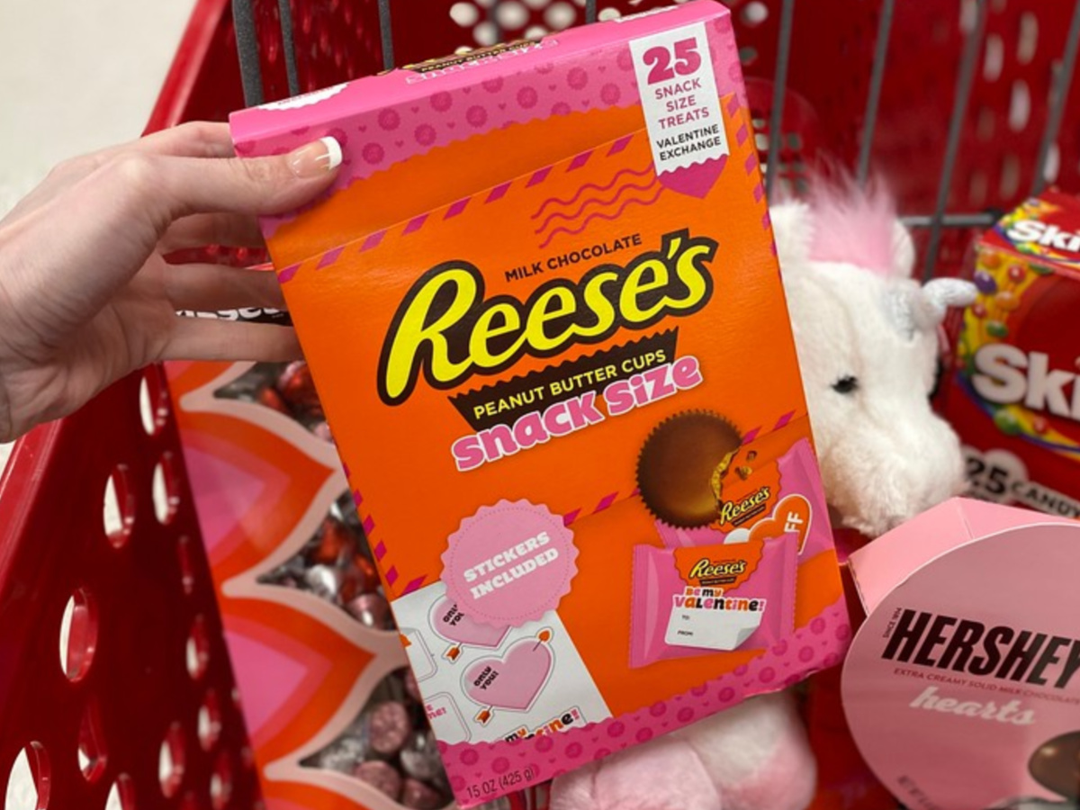 hand holding box of Valentine's Day Reese's snack size candy