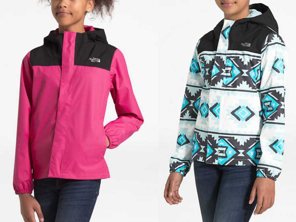 girls wearing black and pink and blue, white, and black The North Face Girls Resolve Reflective Waterproof Jacket