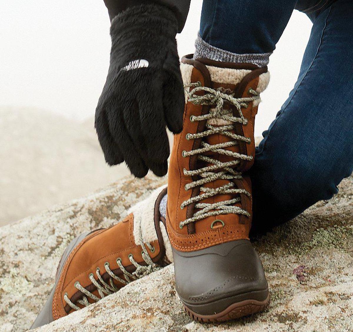 woman wearing brown camel color The North Face Women's Shellista II Mid Boot