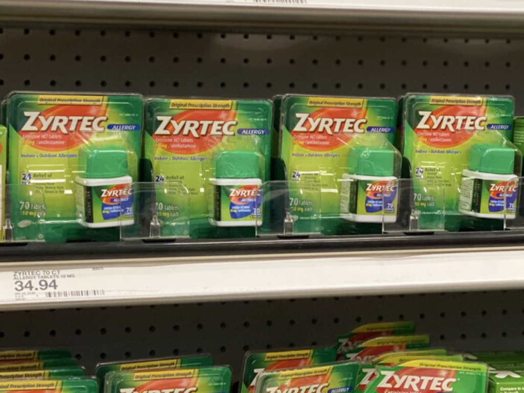 store shelf with four packs of allergy medicine 