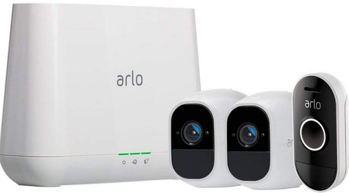 two surveillance cameras, wireless doorbell and base station