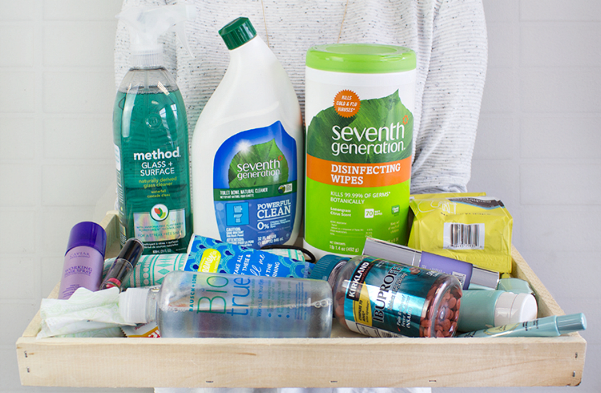 woman holding tray of products