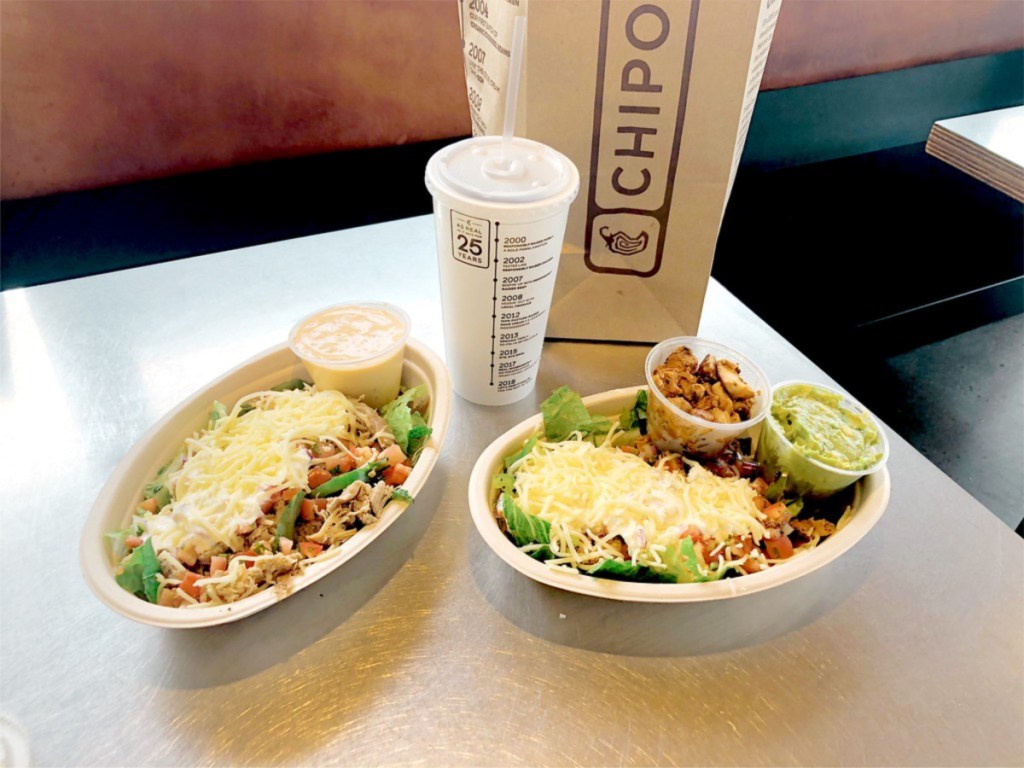 Chipotle bag, drink and food on counter