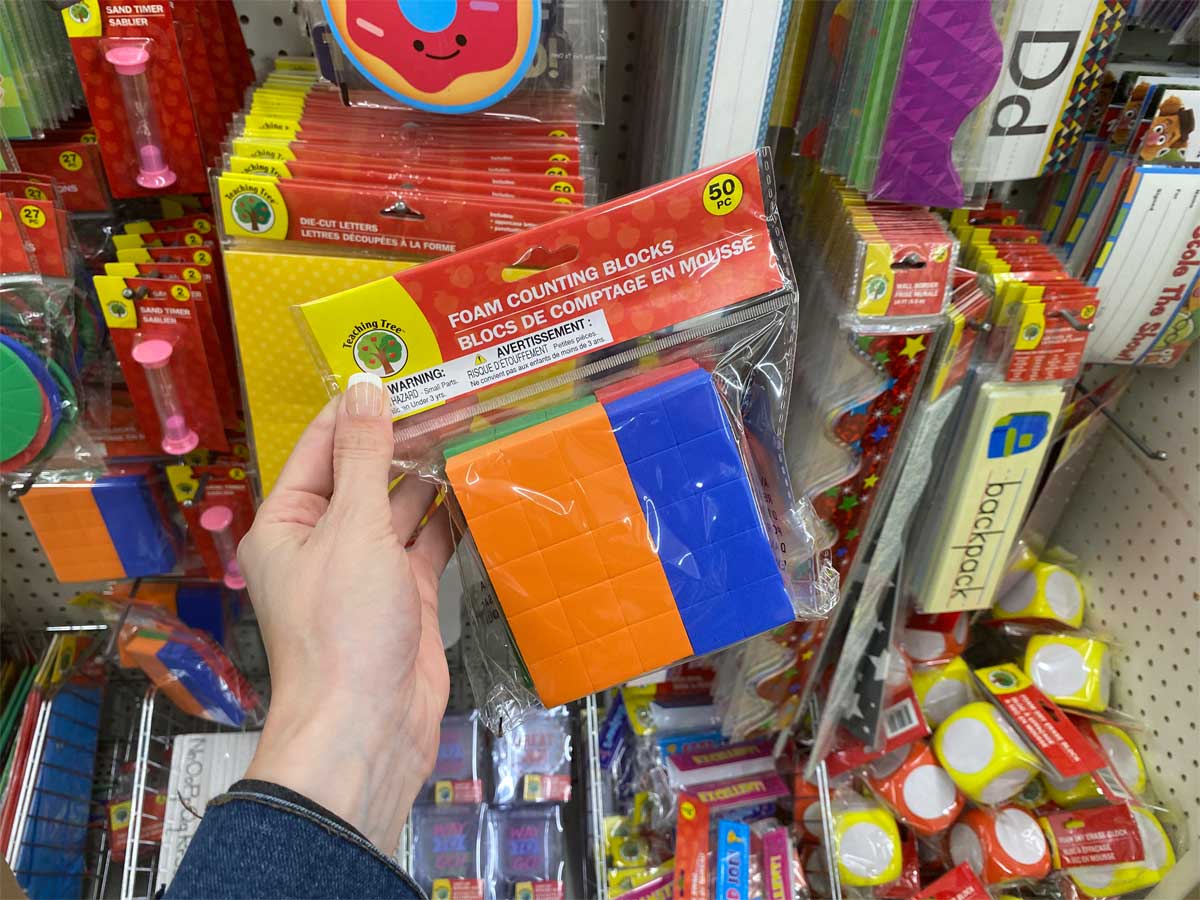 hand holding teaching tree foam counting blocks