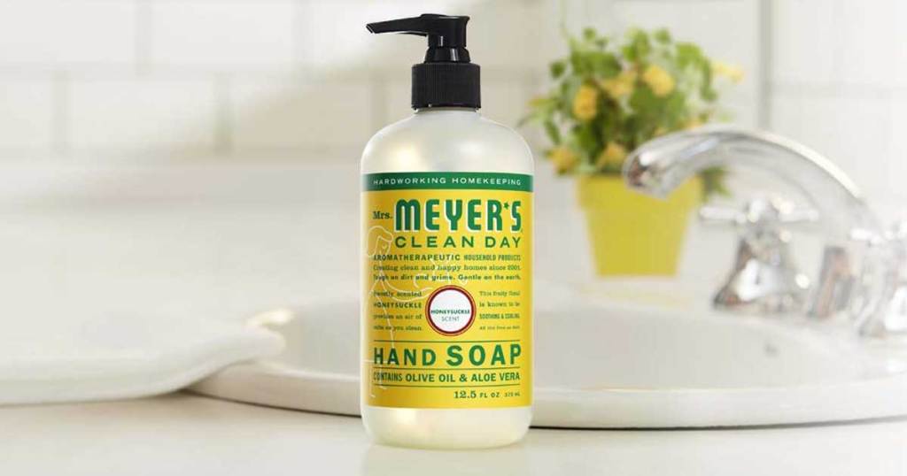 Mrs. Meyer's Clean Day Honeysuckle Hand Soap on a bathroom counter