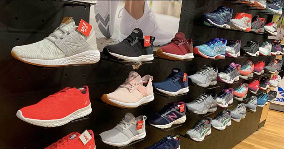 new balance shoes on wall display