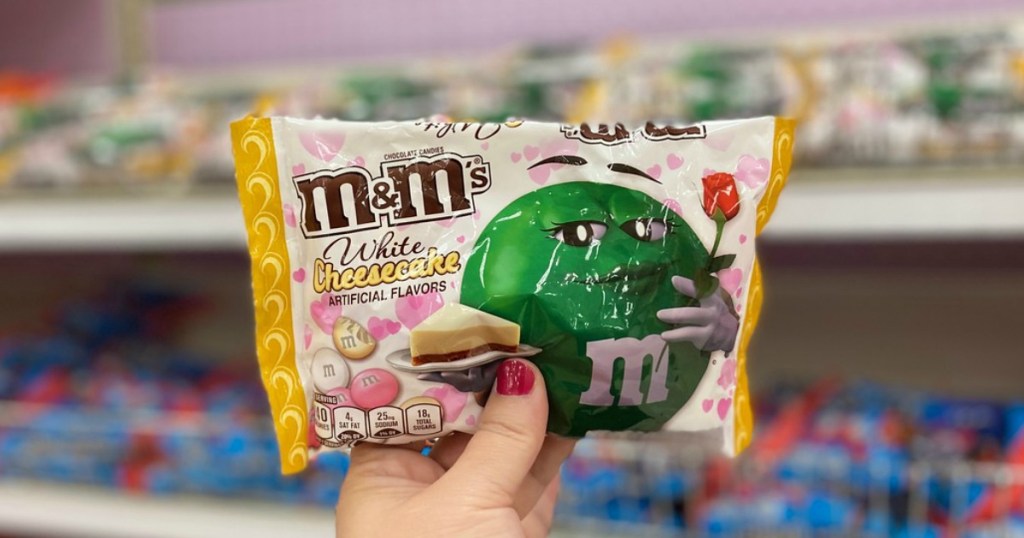 hand holding valentine's day candy in a store