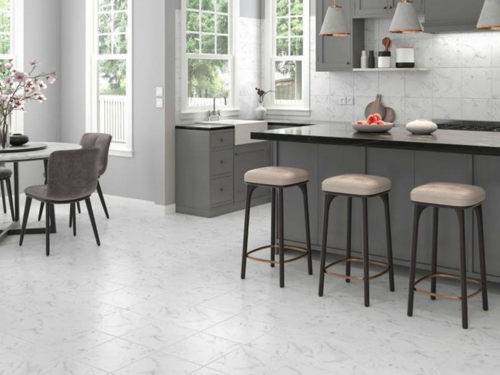 kitchen with stools and a dining table