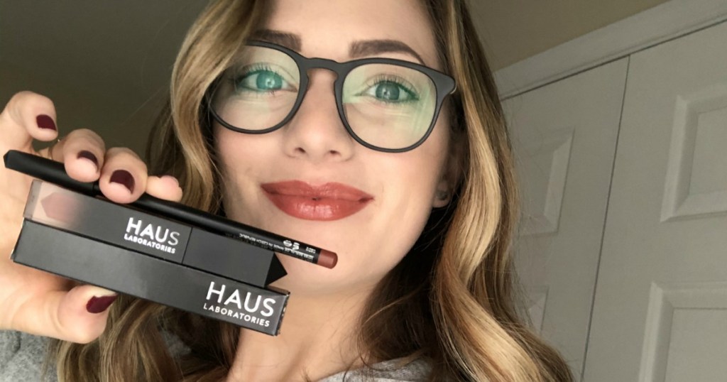 woman holding haus laboratories cosmetics 