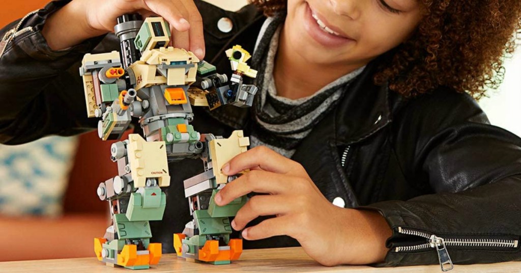 child playing with a LEGO set