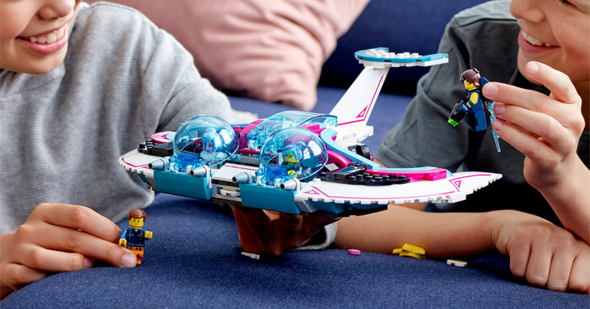 kids playing with LEGO spaceship