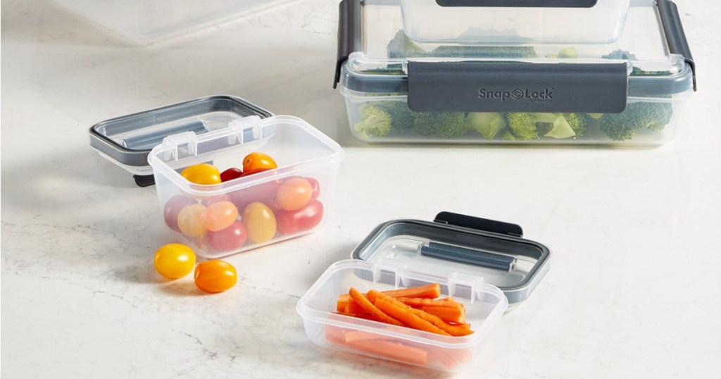 carrots, grape tomatoes, and broccoli in food storage containers on counter