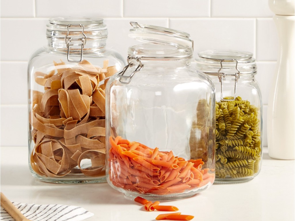 dry pastas in food canisters on kitchen counter