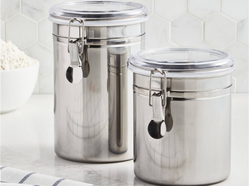 two stainless steel food storage containers on kitchen counter