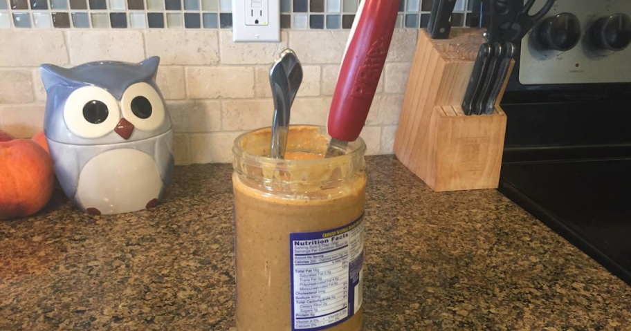 onlineparison of regular knife with large red peanut butter knife in a jar