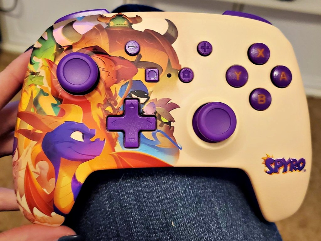 PowerA Enhanced Wireless Spyro Controller for Nintendo Switch in hand