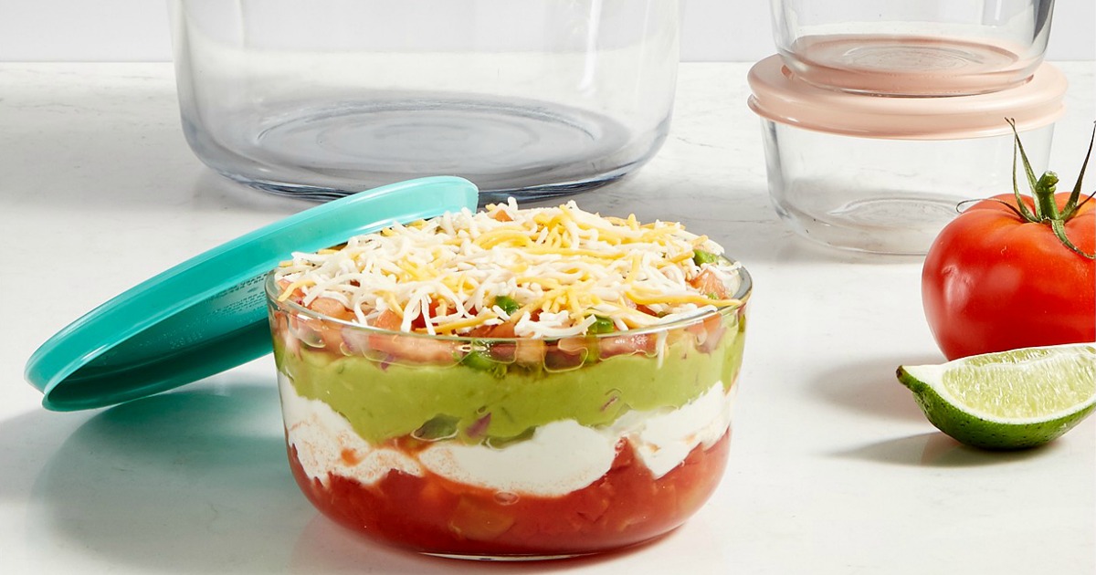 A variety of sizes of Pyrex glass dishes on counter