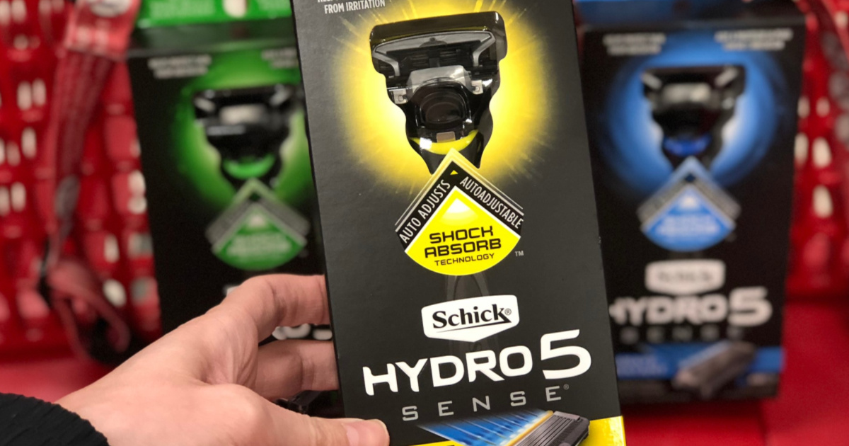 man holding Schick hydro 5 razor