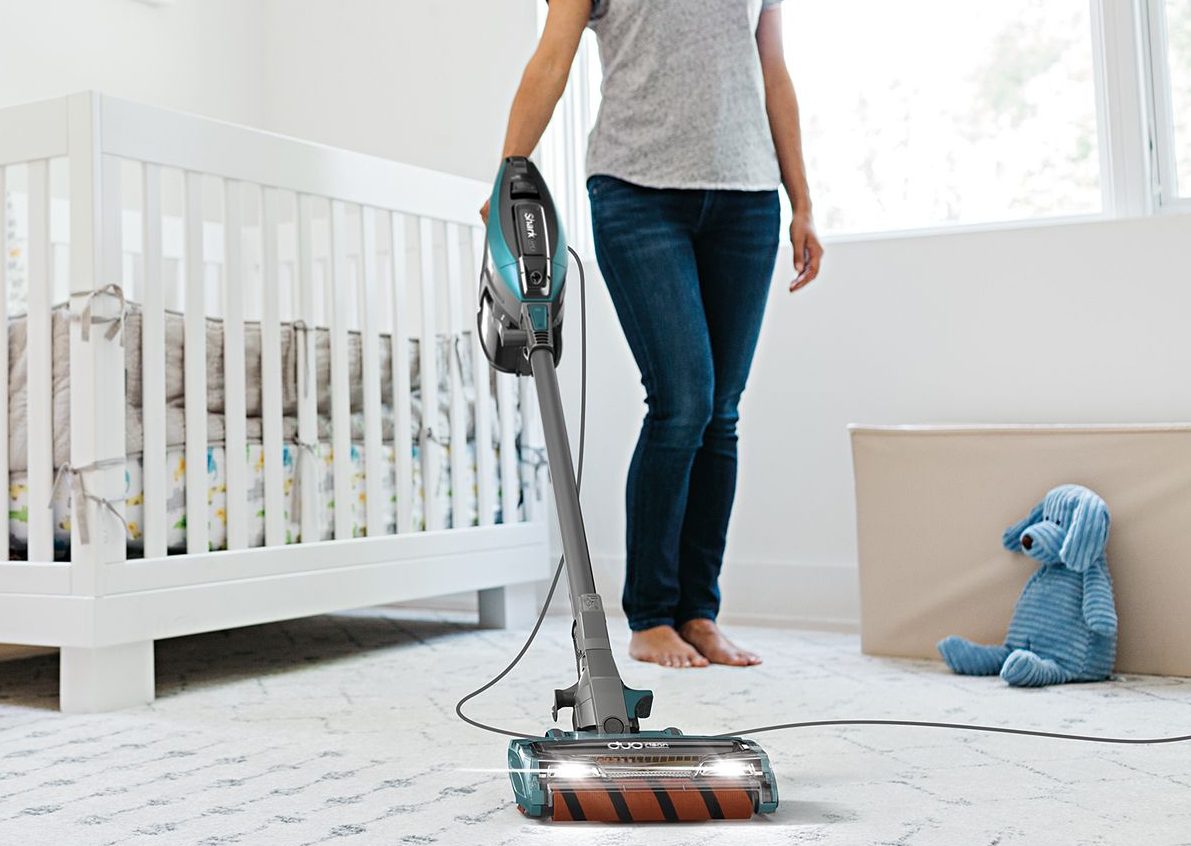 woman using a vacuum