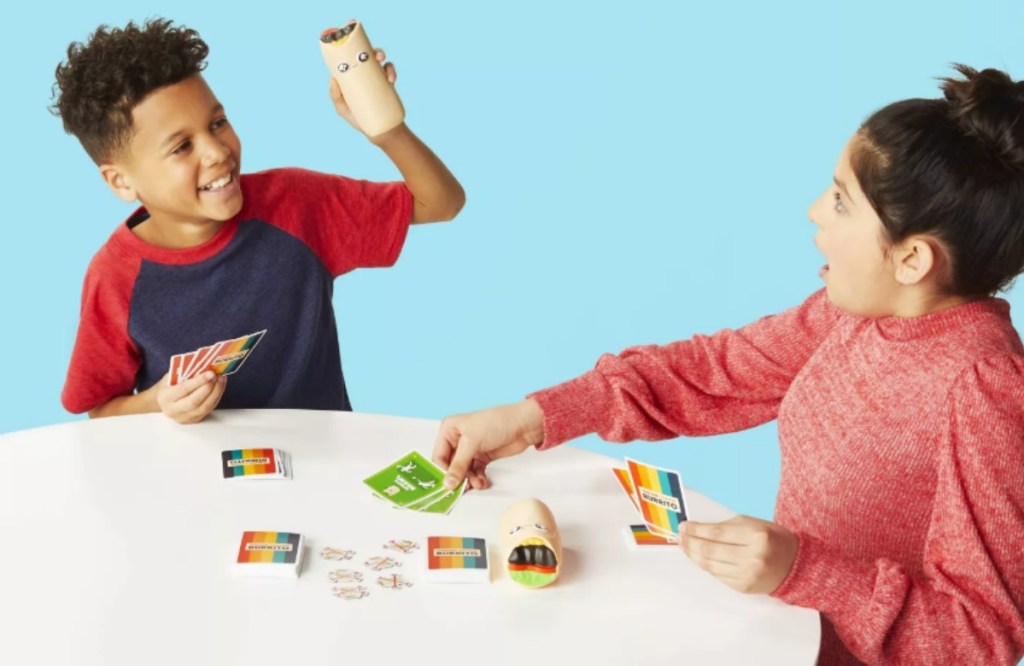 kids playing Throw Throw Burrito card game