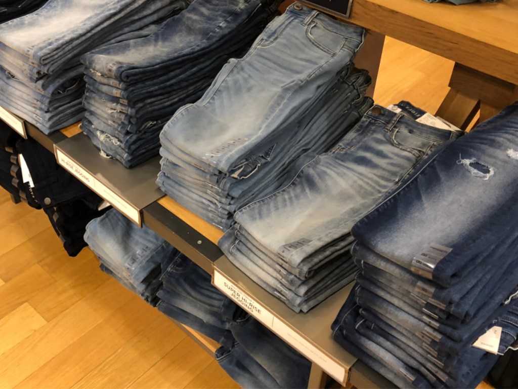 american eagle jeans folded on display in store