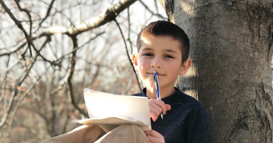 boy using printable puzzles for kids