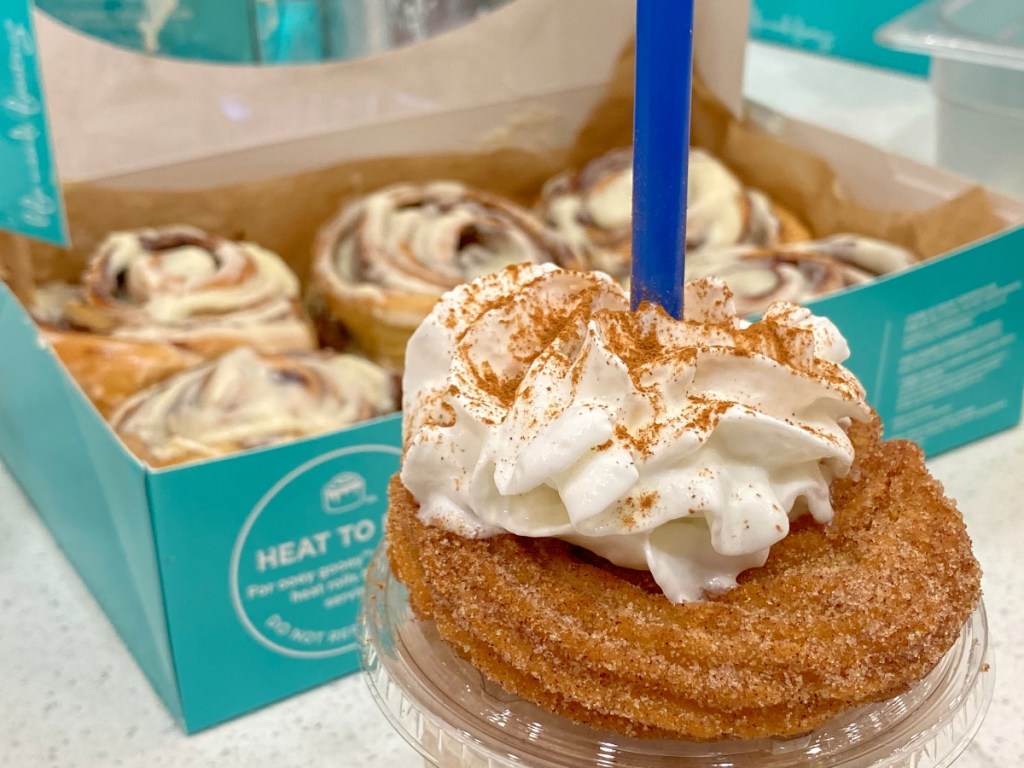 churro on milkshake topped with whipped cream