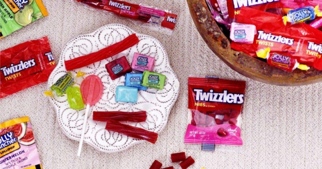 Twizzlers, jolly ranchers on plate and in bowl