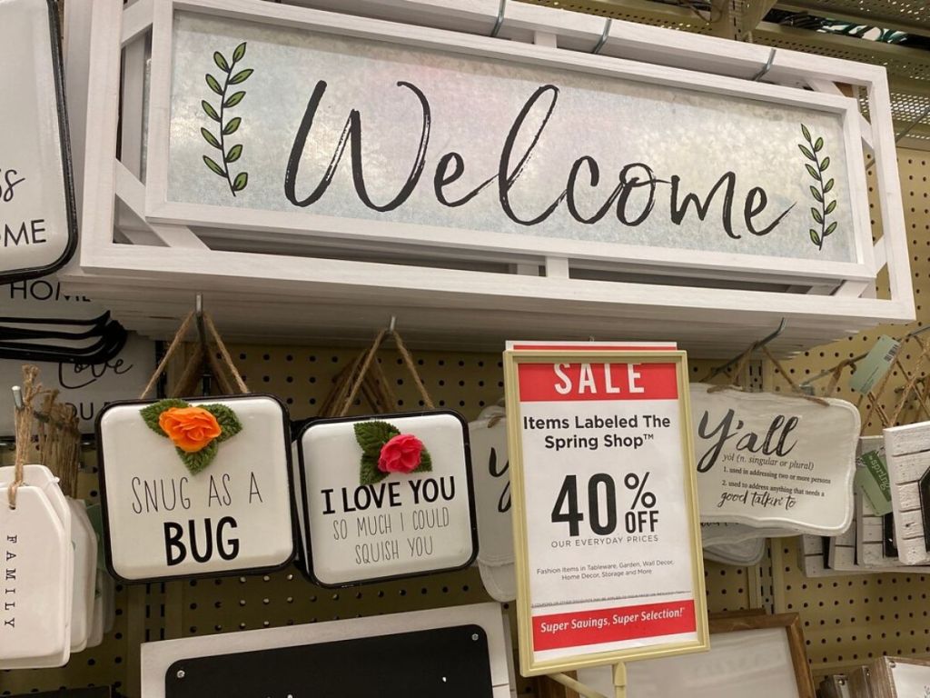 store display of metal wall signs