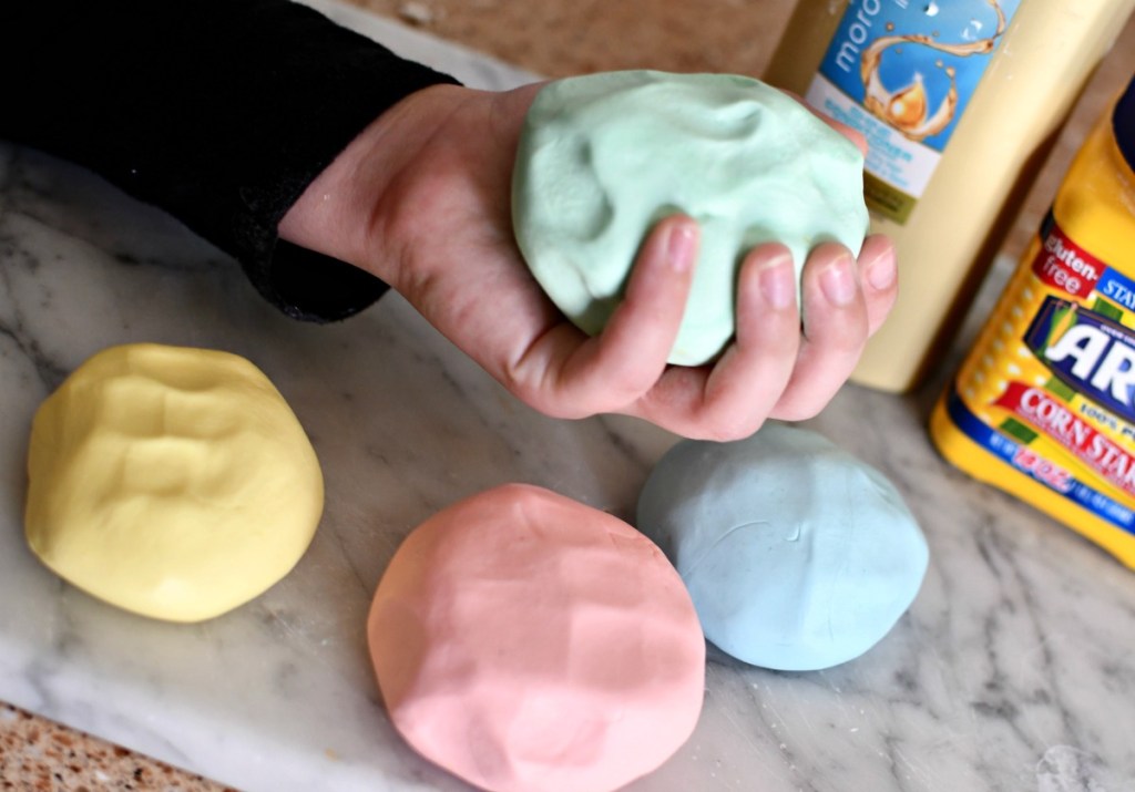 holding homemade play-dough