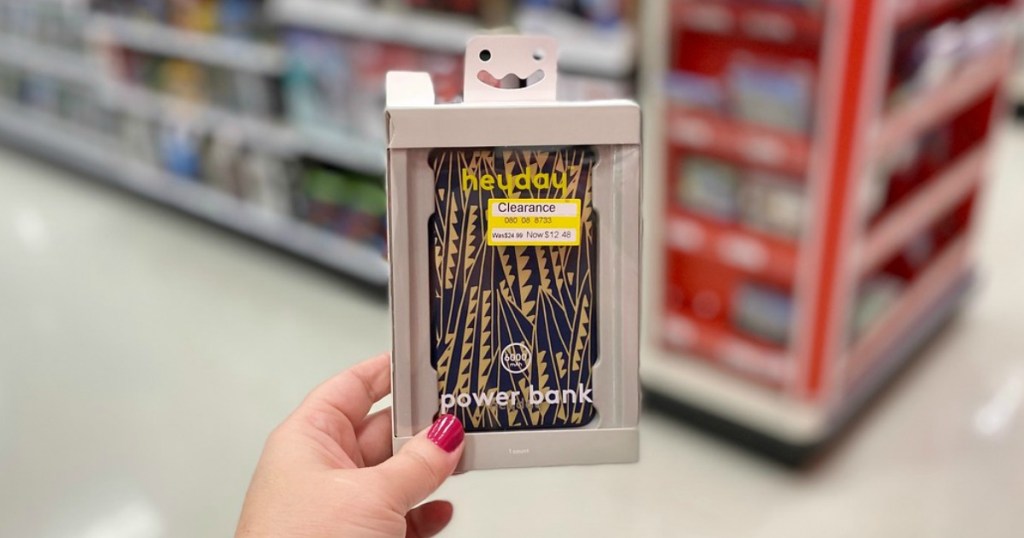 hand holding clearance phone accessories in a store