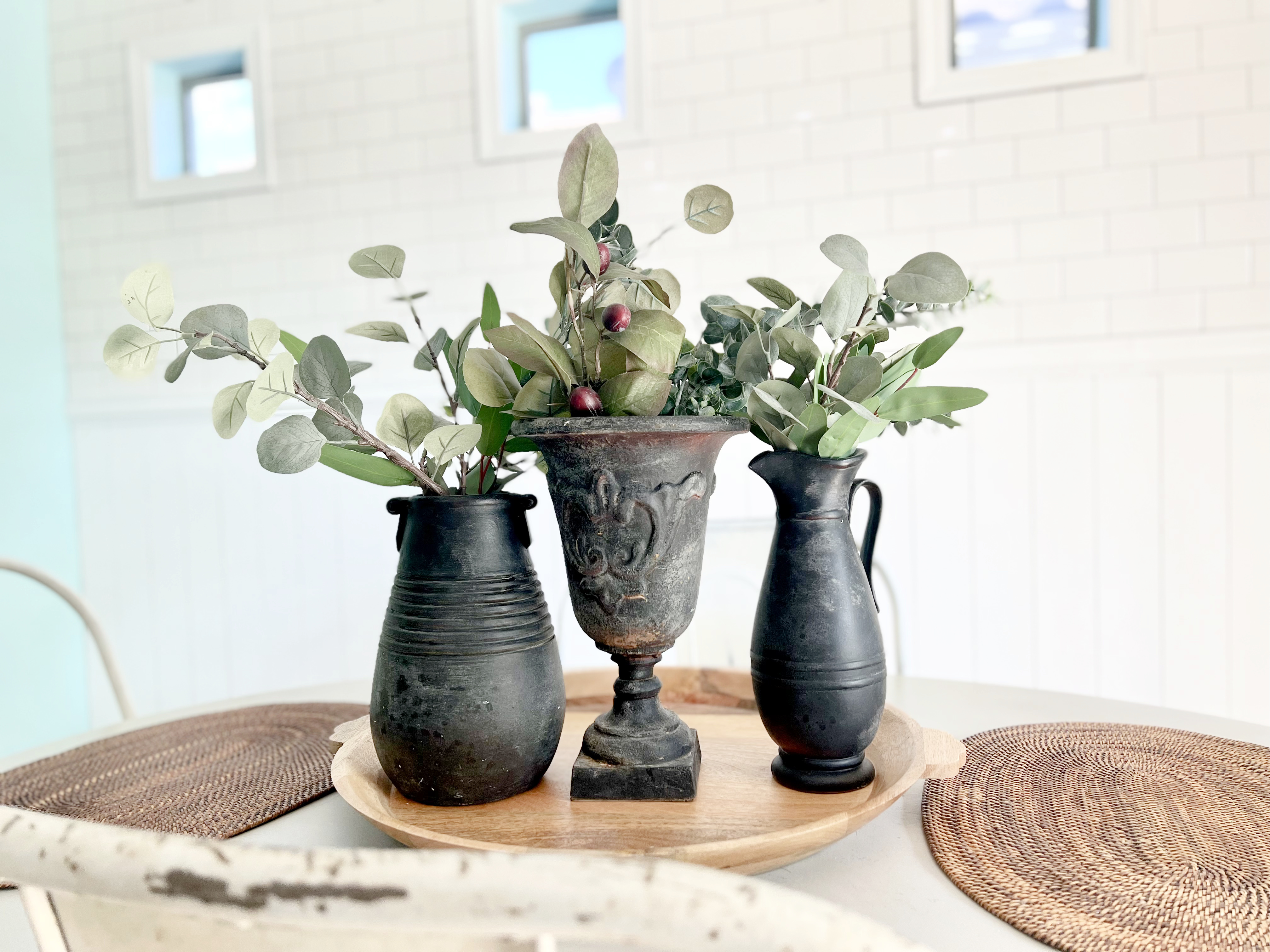 3 spray paint vases on the table