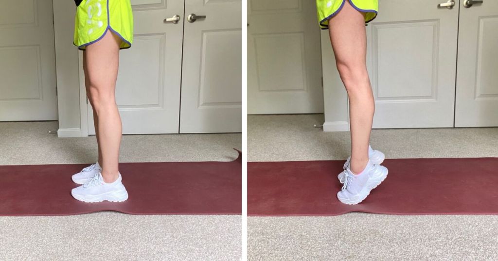 Woman wearing shorts and demonstrating calf raises at home