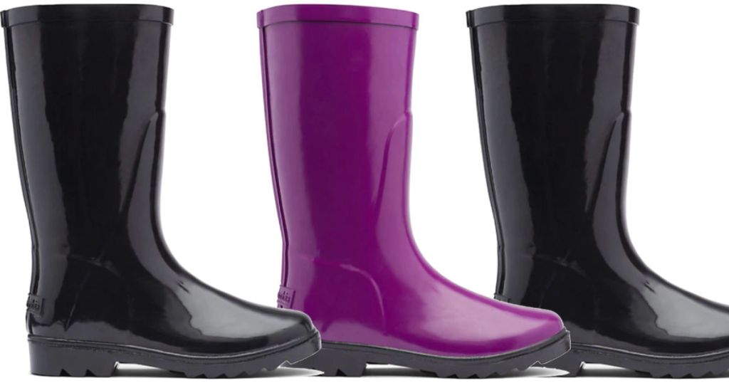 two black and one purple pair of kids columbia rain boots