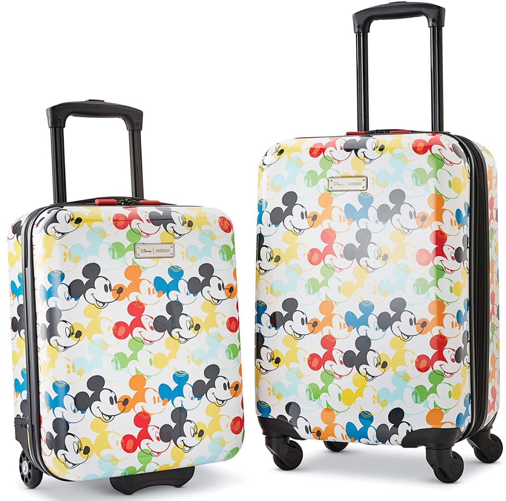 set of two hardside luggage with mickey mouse heads printed in rainbow colors