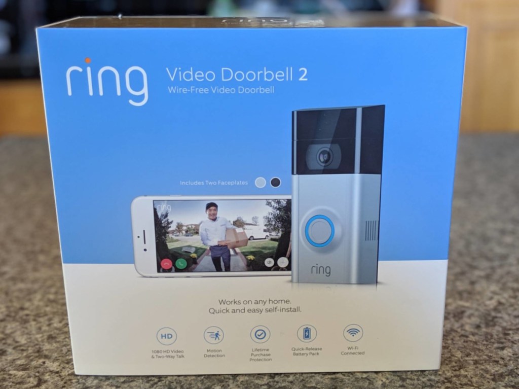 video doorbell in box on counter in home