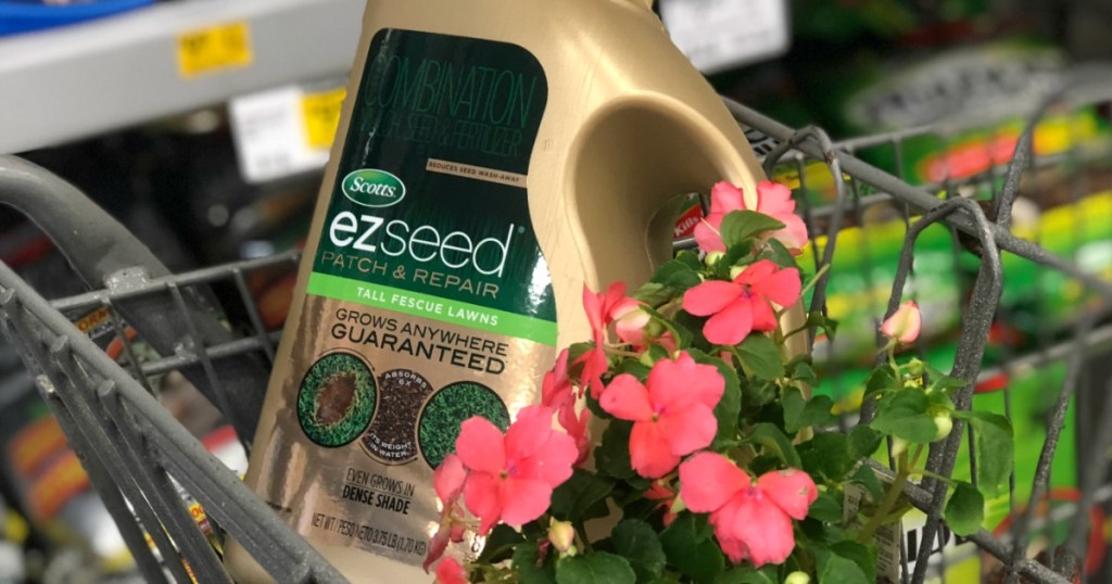 Scott's EZ Seed container in cart with flowers