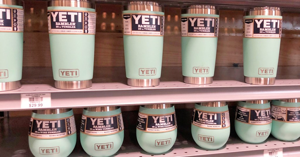 store display shelves of light blue yeti brand tumblers