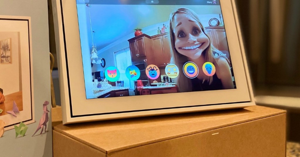 woman using face filter on Facebook portal